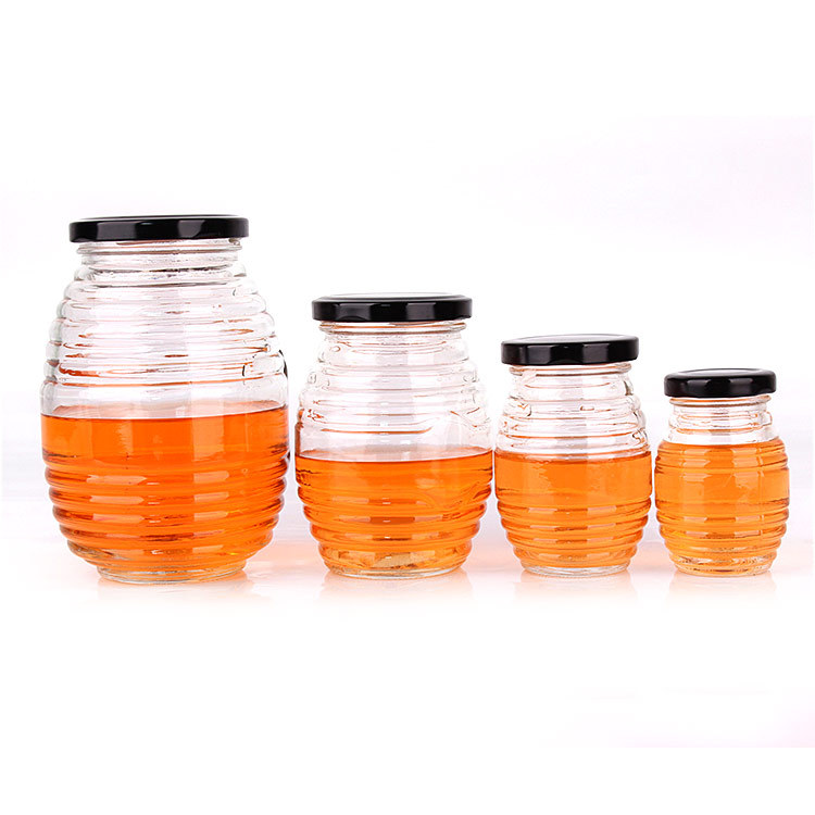 Empty 100ml 180ml 380ml 730ml Honeycomb Shaped Glass Honey Jar with Metal Lid Wholesale